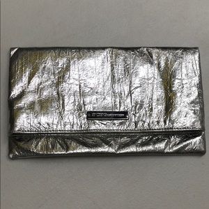 BCBG envelope clutch. Zipper and magnetic closure